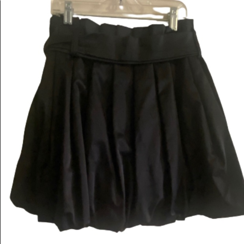 Black mini skirt. French Fry brand. Balloon hem. New. Never worn. Size small.